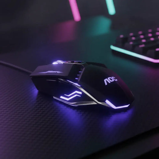 Gaming mouse with RGB lighting on a desk